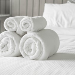white towel on the bed